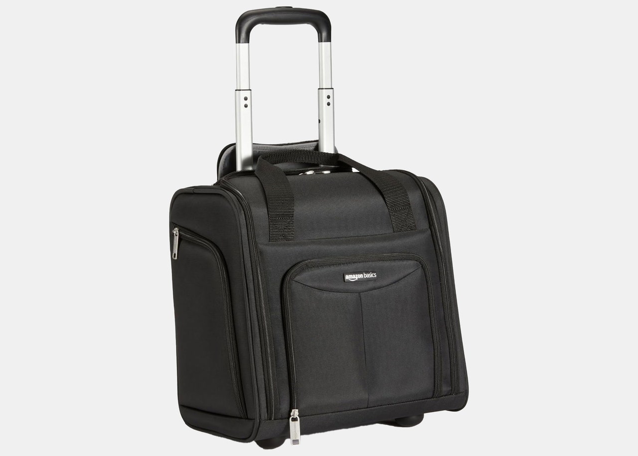 Image may contain: Baggage, Suitcase, Accessories, Bag, and Handbag