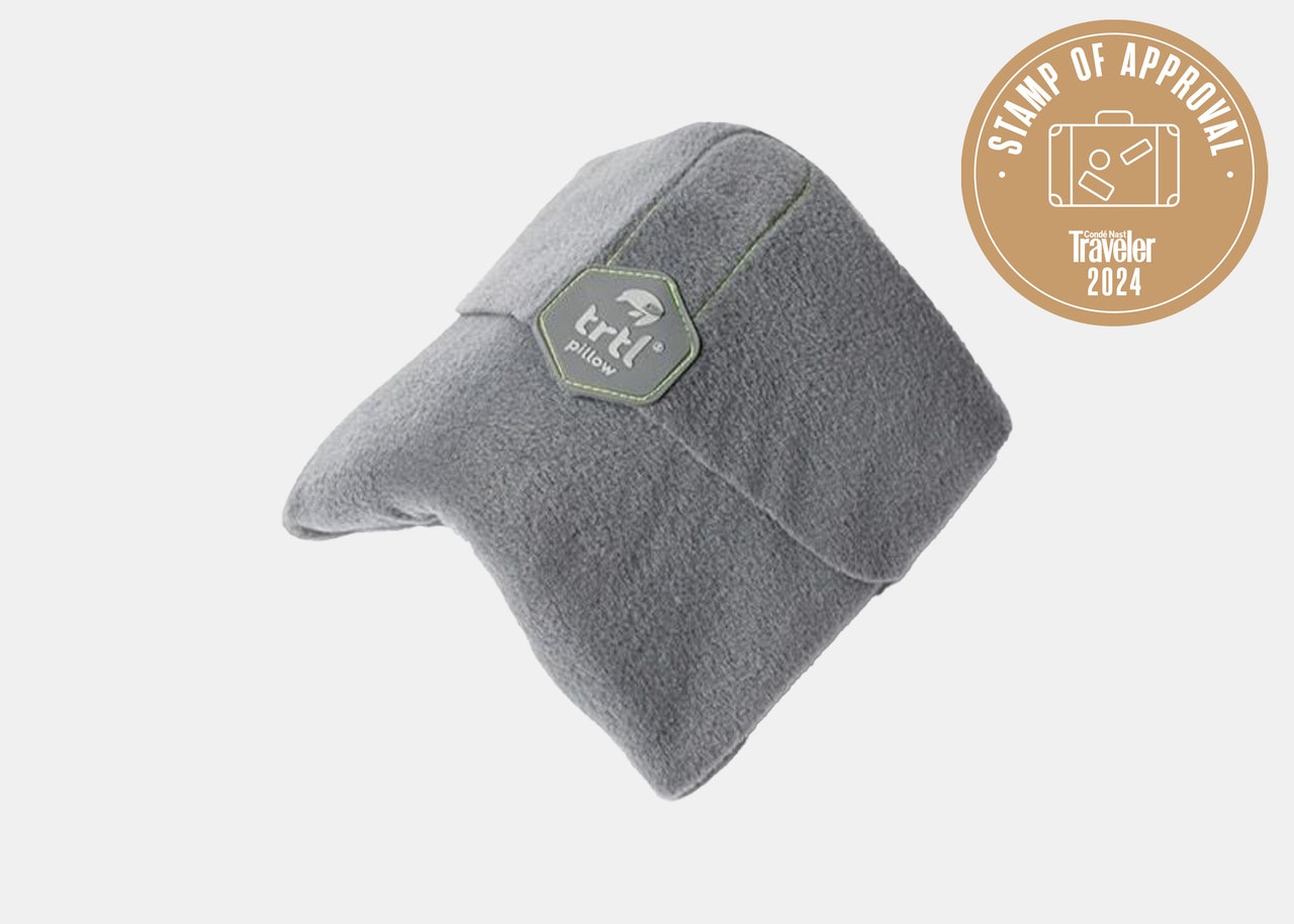 Image may contain: Clothing, Fleece, Cushion, Home Decor, Hat, Cap, and Pillow